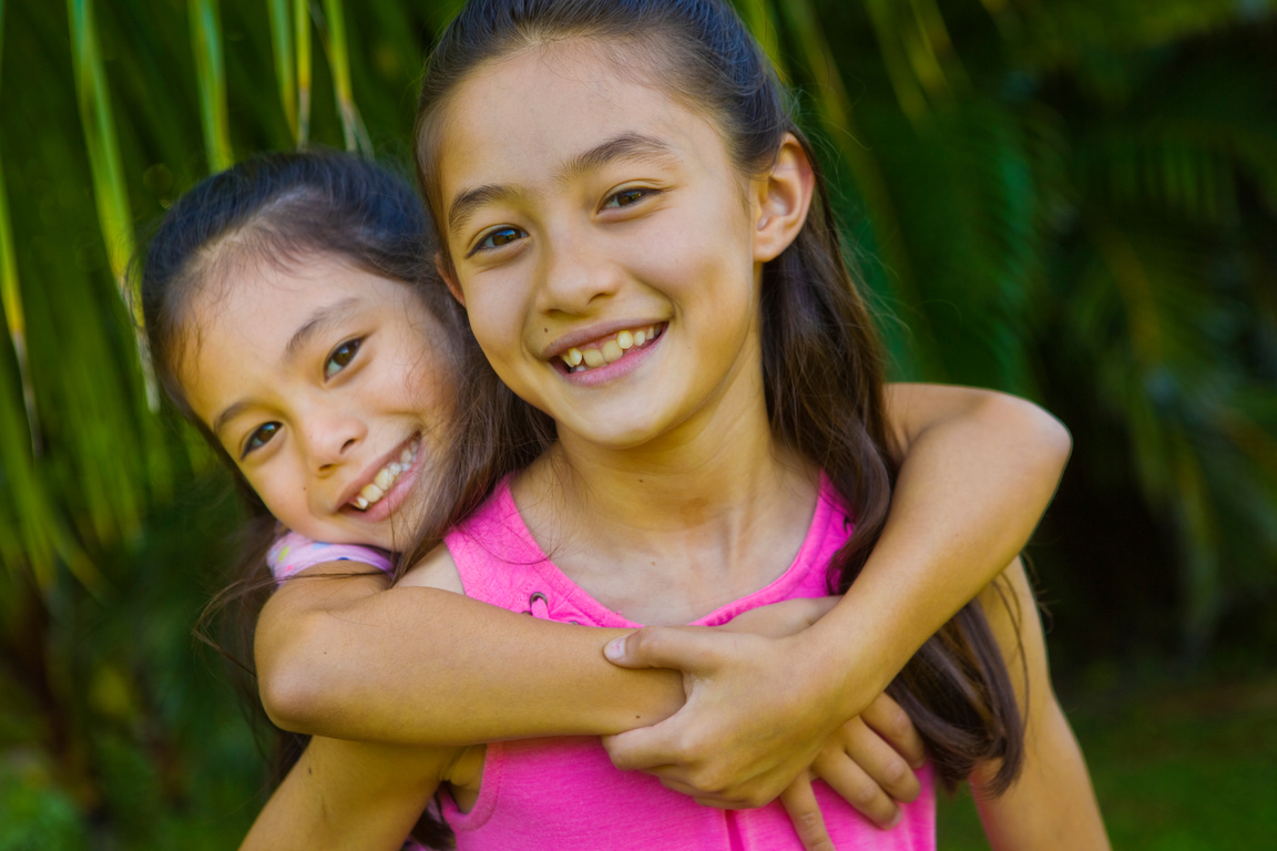 Hawaiian Family Outdoor Portrait with Two Preteen Adolescent Girls